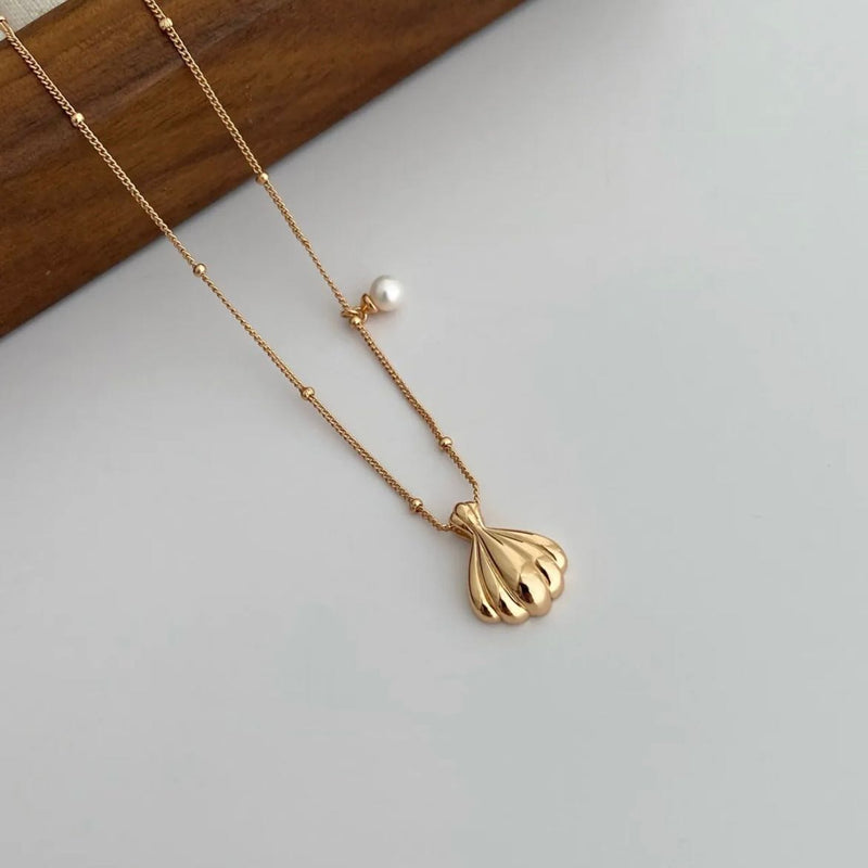 Pure silver with 18K gold plating | Shell and Pearl