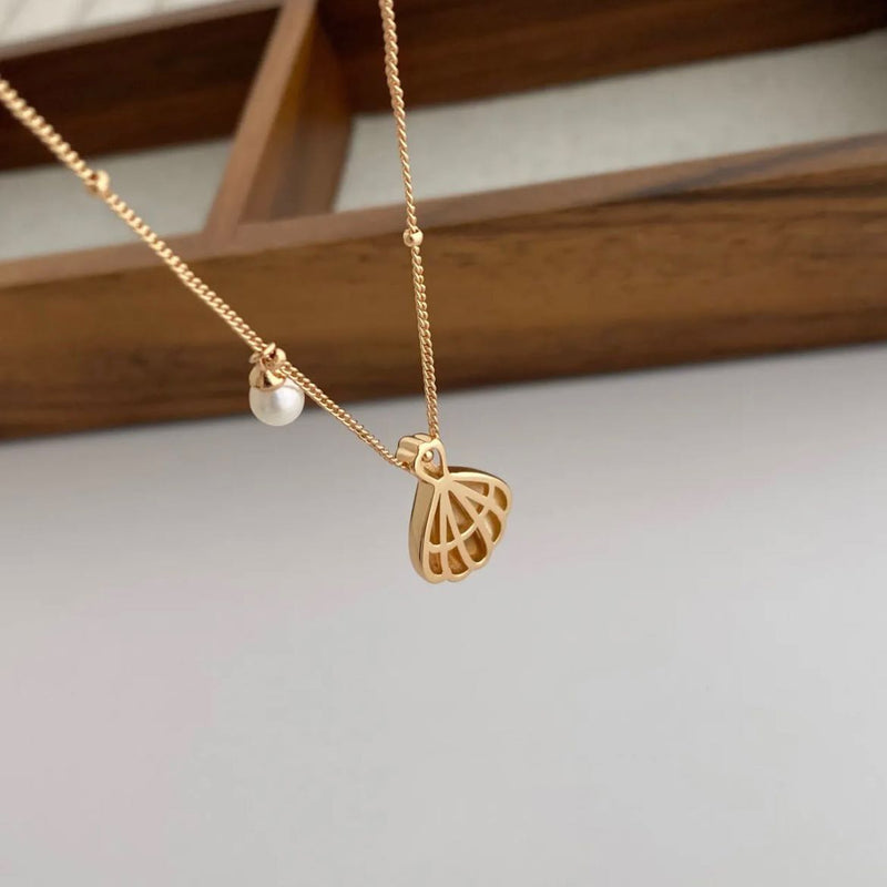 Pure silver with 18K gold plating | Shell and Pearl