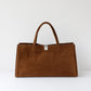Brown tote bag on a white background