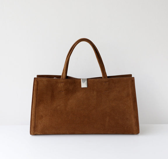 Brown tote bag on a white background