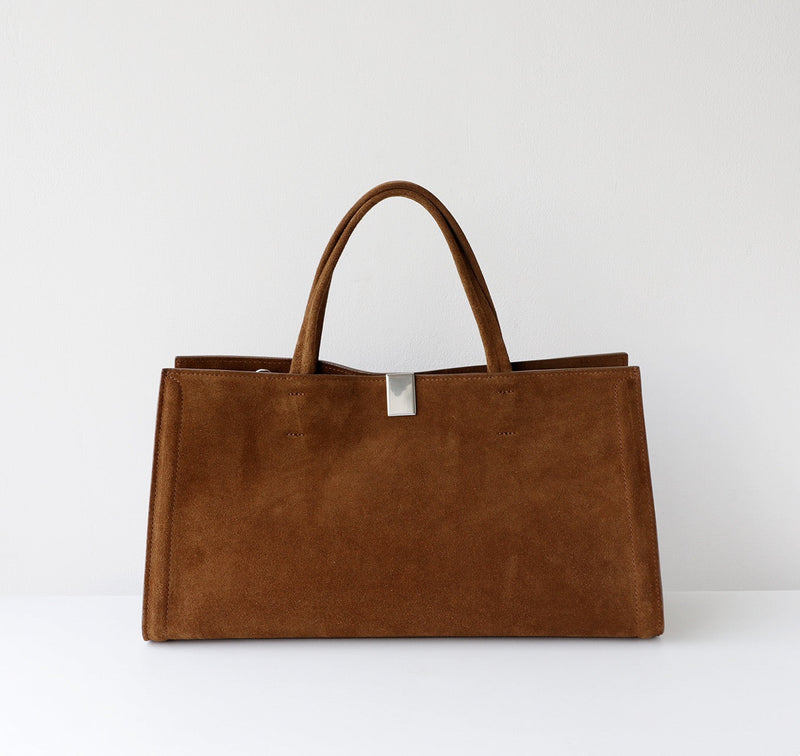 Brown tote bag on a white background