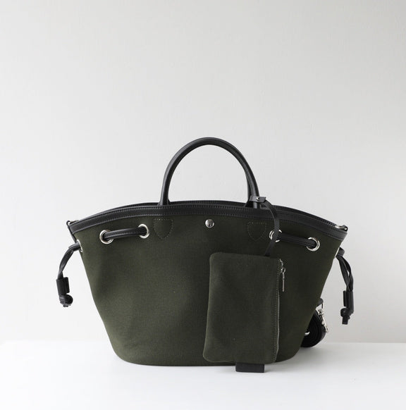 Black handbag with a smaller pouch on a white background