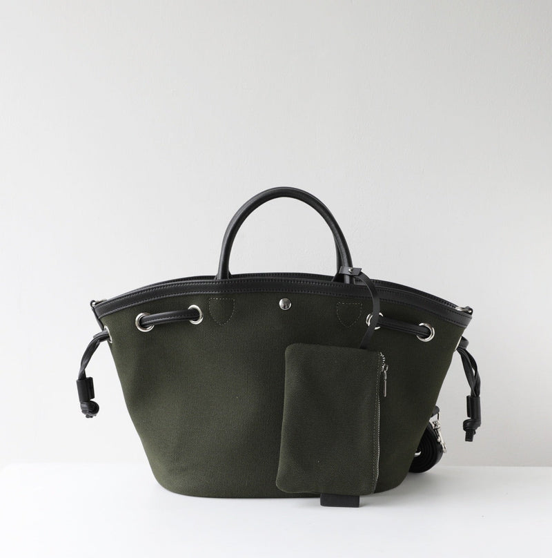 Black handbag with a smaller pouch on a white background