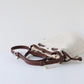 Brown leather bridle on a white background