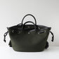 Black leather handbag on a white background