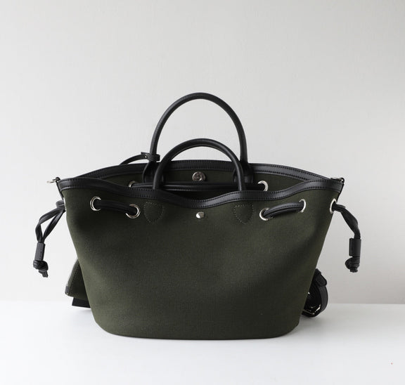 Black leather handbag on a white background