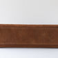 Brown leather clutch bag on a white background