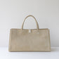 Beige handbag leather on a white background with 'Product Display' text.