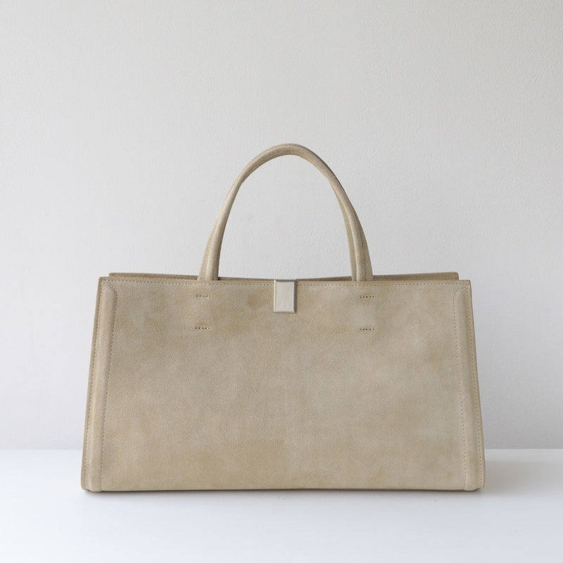 Beige handbag leather on a white background with 'Product Display' text.